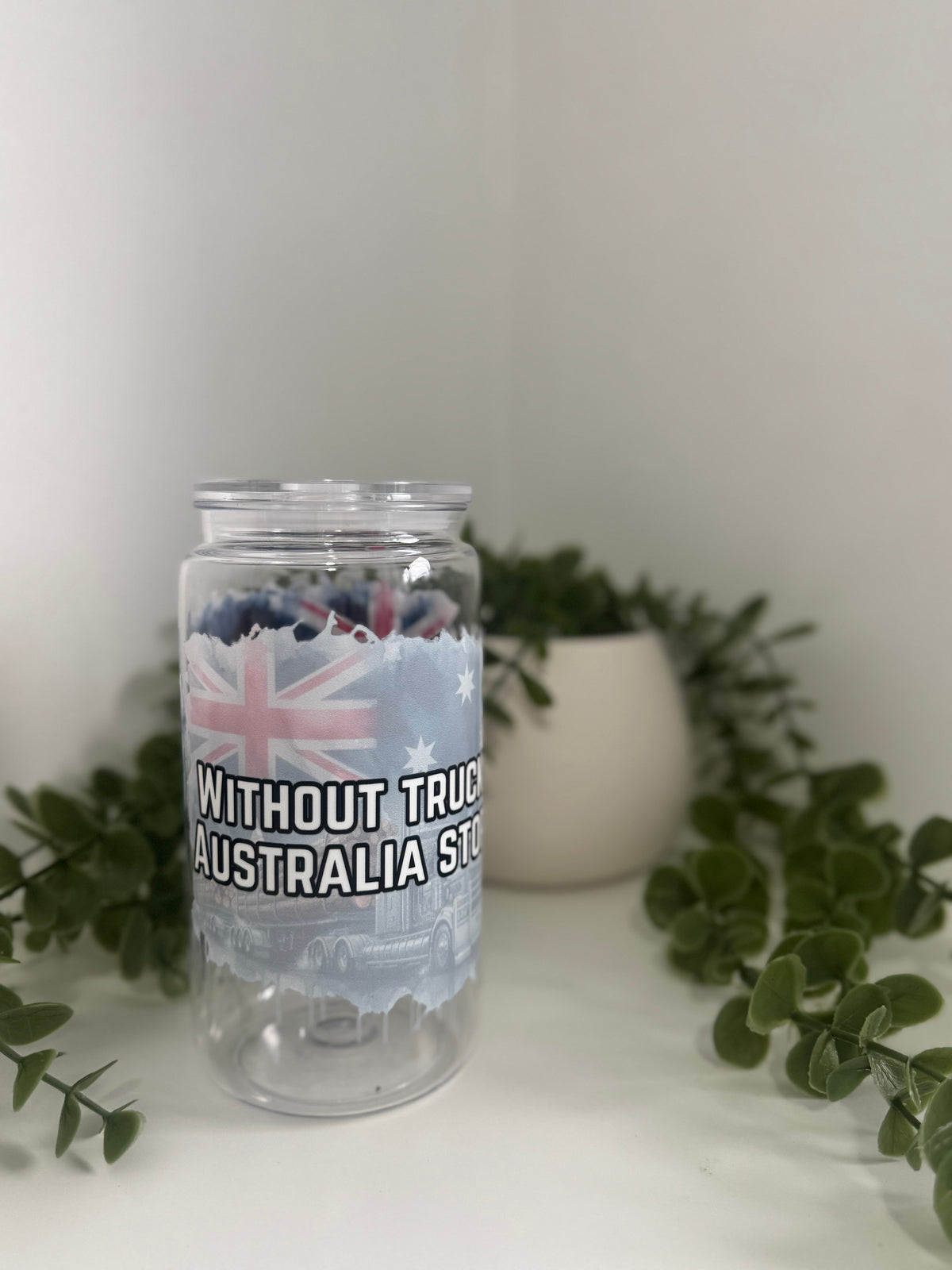 Without trucks Aus stops beer can cup