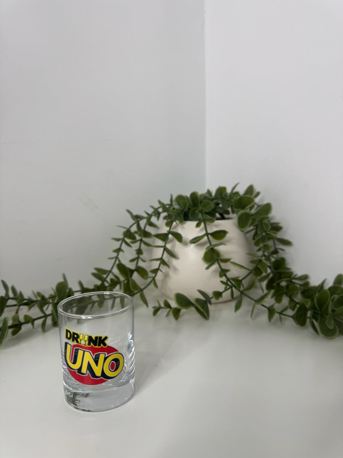 Drunk uno shot glass