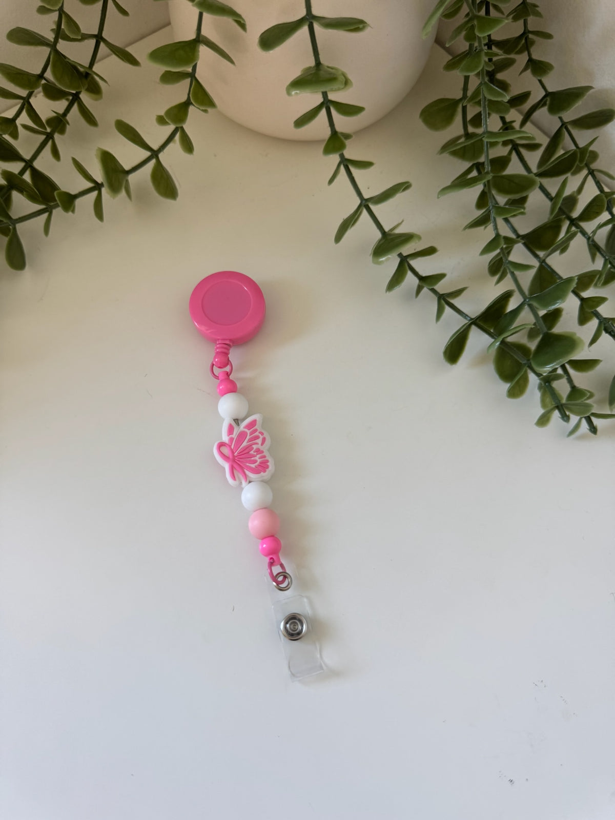 Breast cancer badge reel