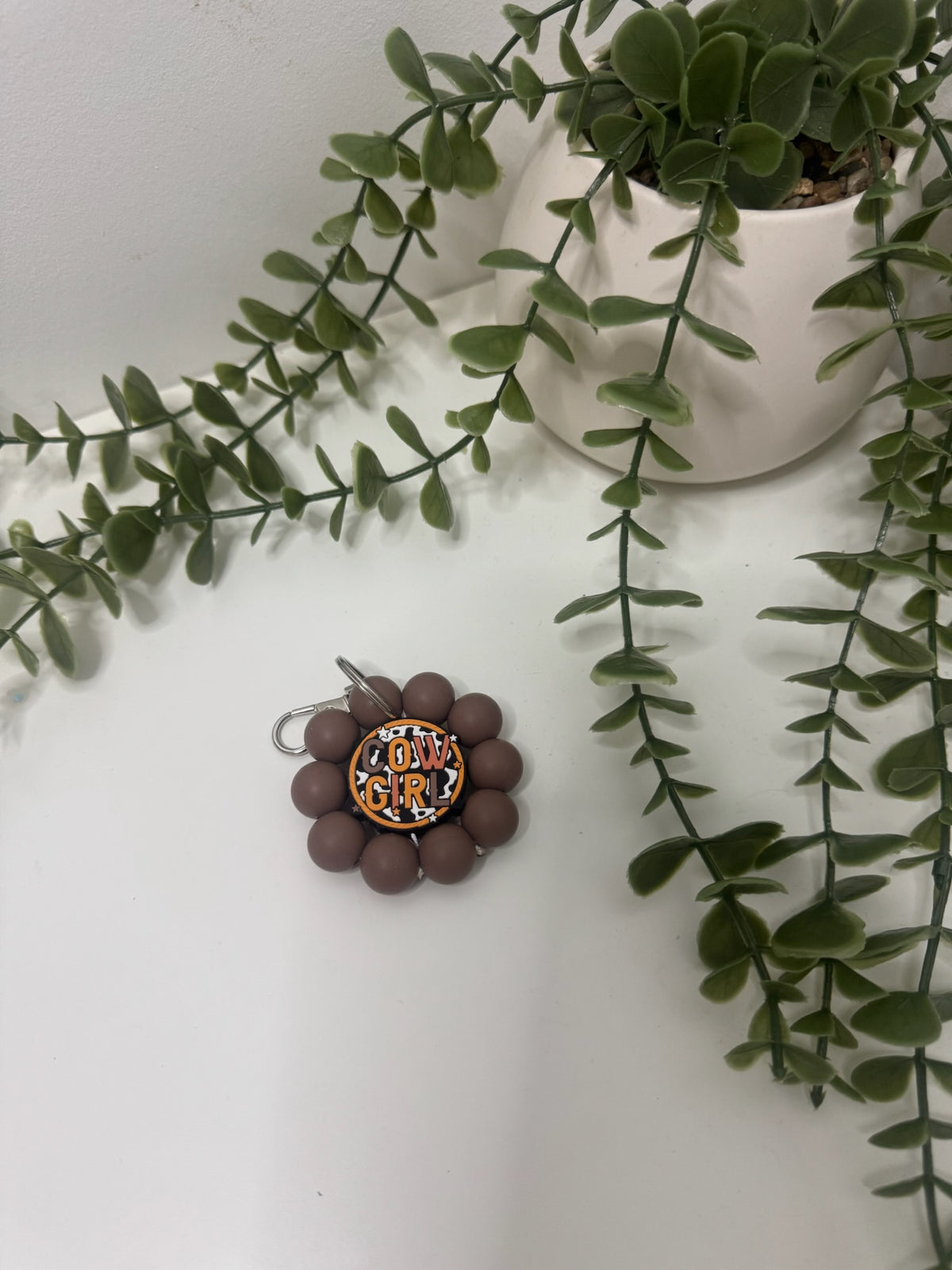 Cowgirl flower keychain