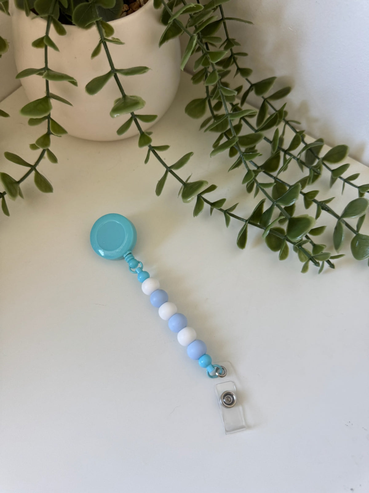 Blue badge reel