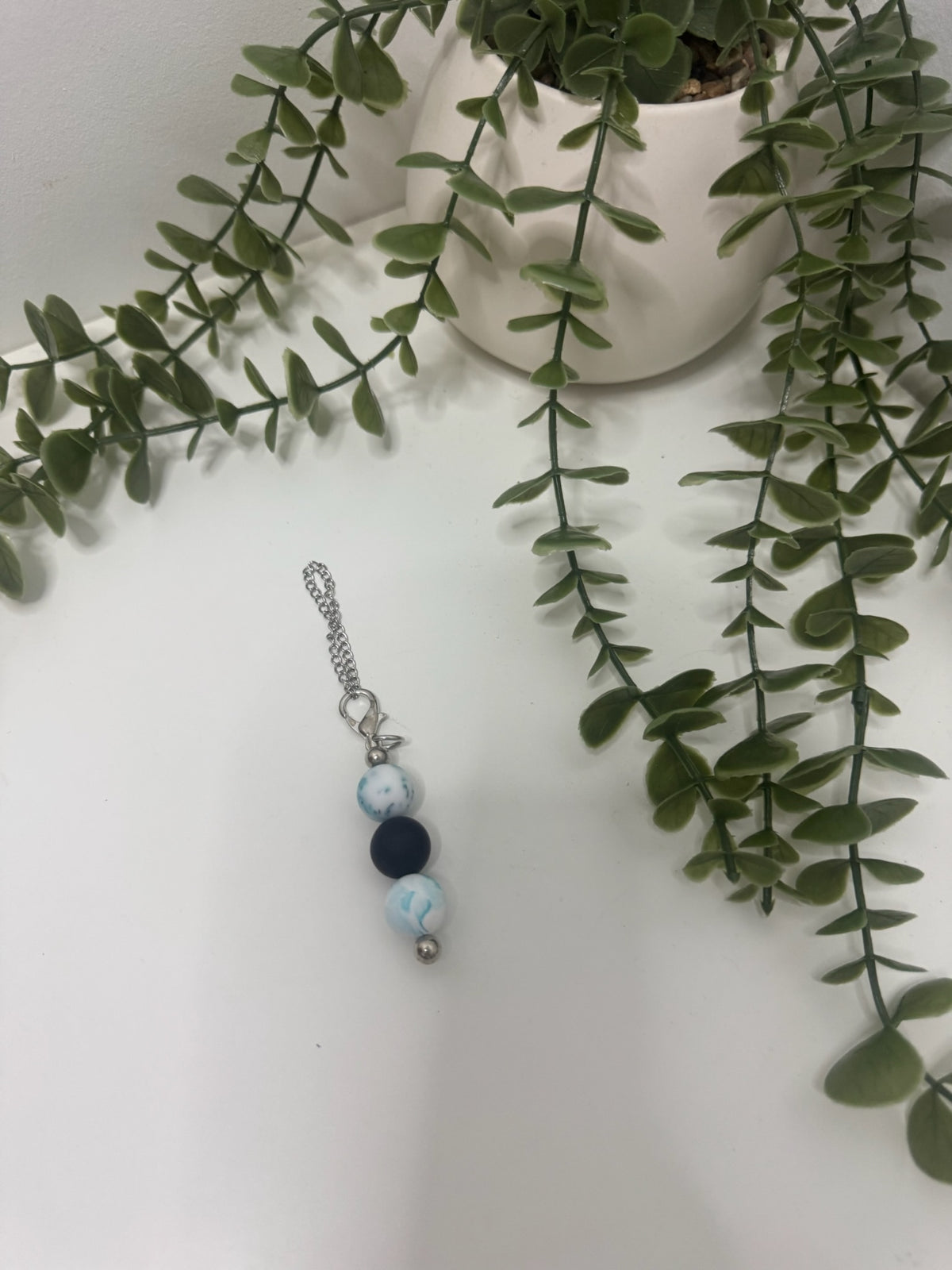 Marble blue beaded cup charm