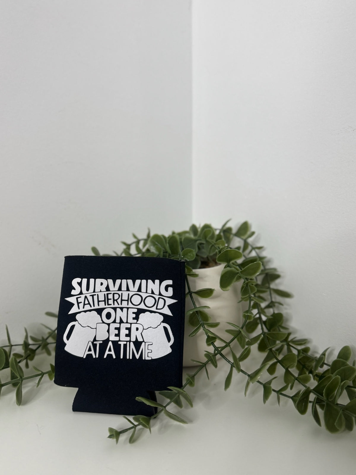 Surviving fatherhood stubby cooler