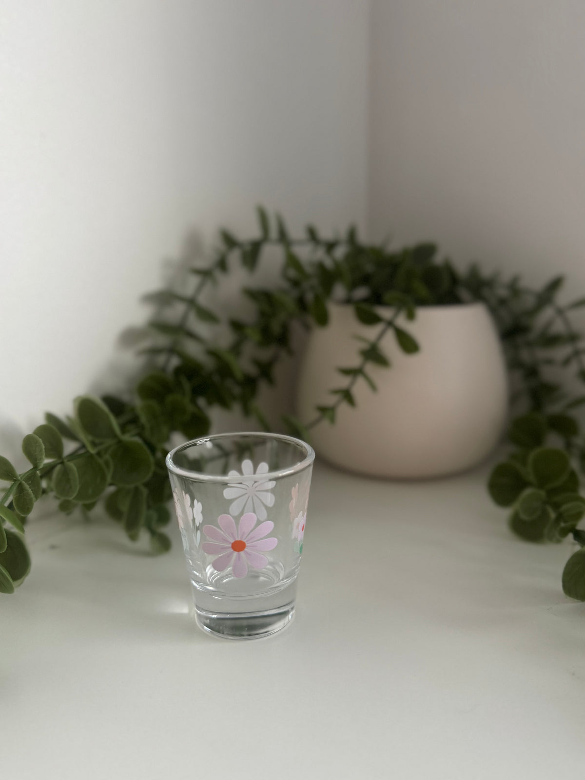 Purple flowers shot glass