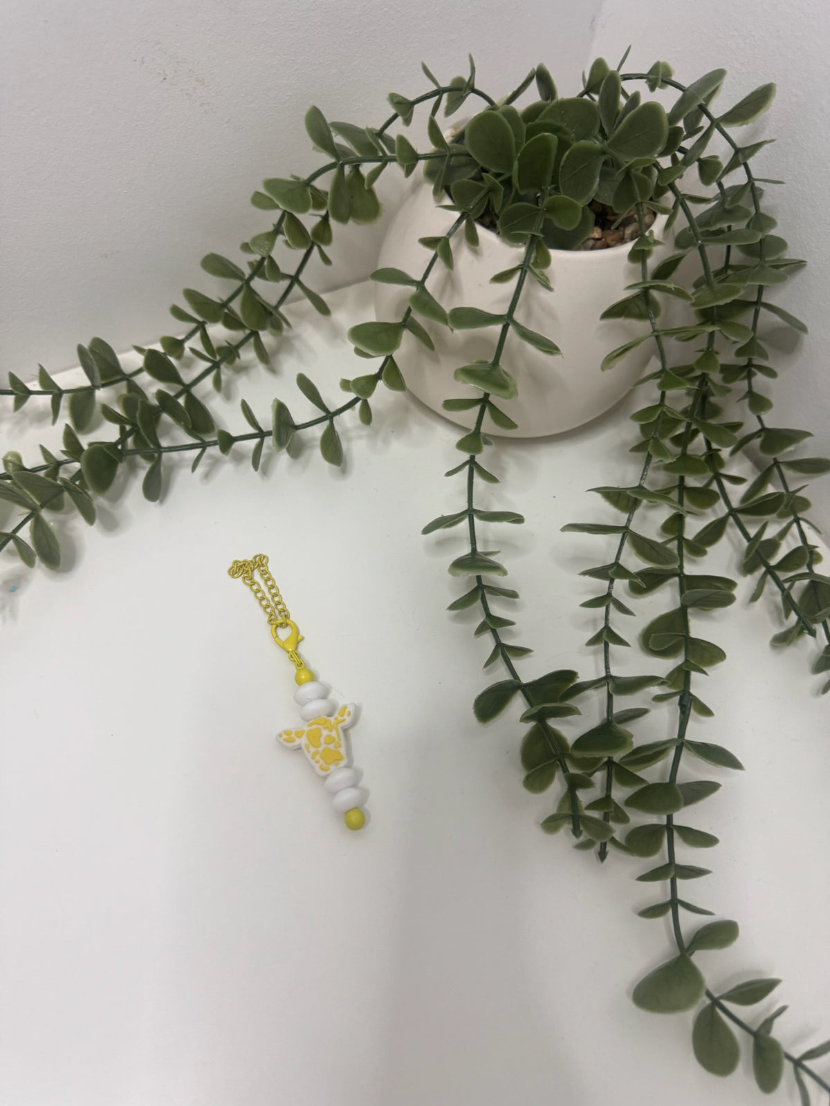Yellow cow beaded cup charm