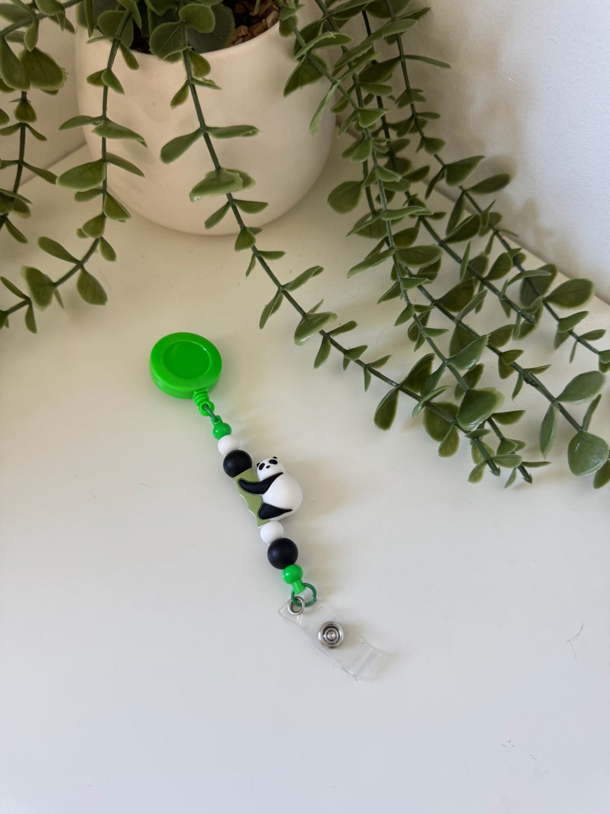 Panda badge reel