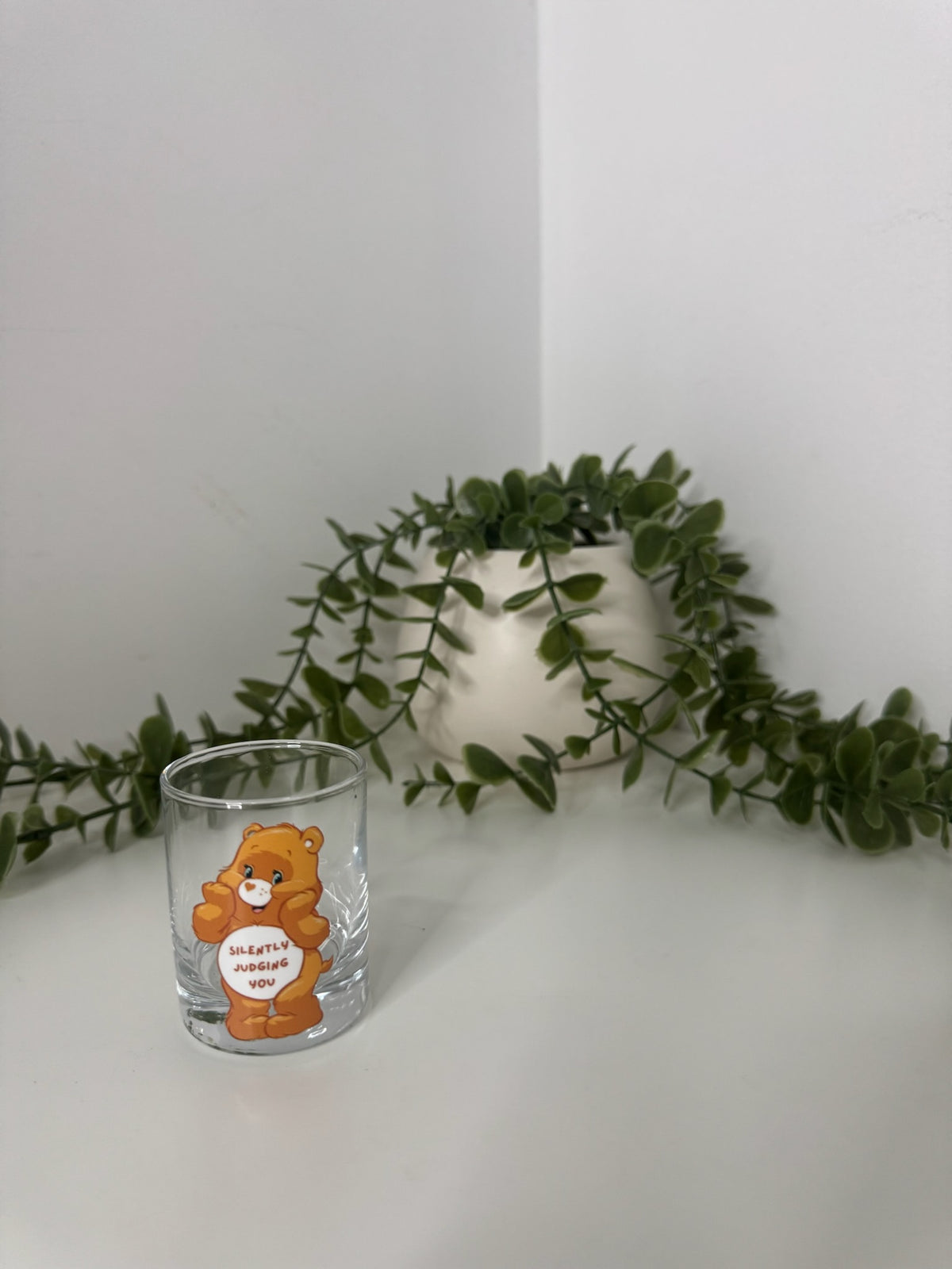 Orange Care Bears shot glass
