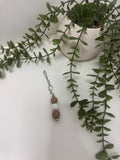 Brown beaded cup charm