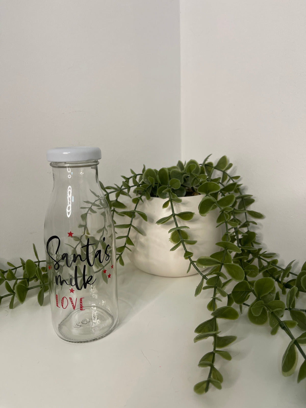 Black Santa’s milk bottle