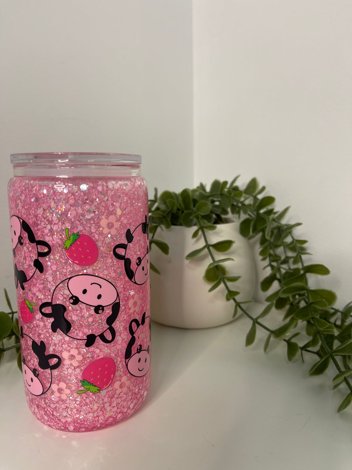 Pink cows glass beer can snow globe