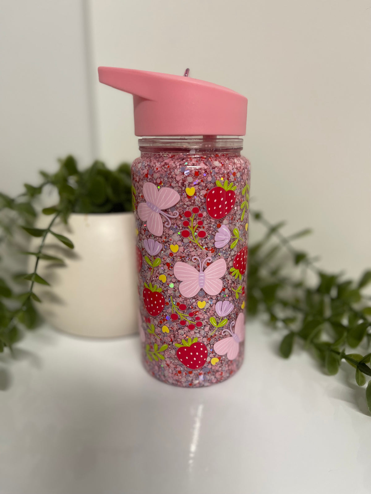 Butterflies and strawberries kids snow globe water bottle