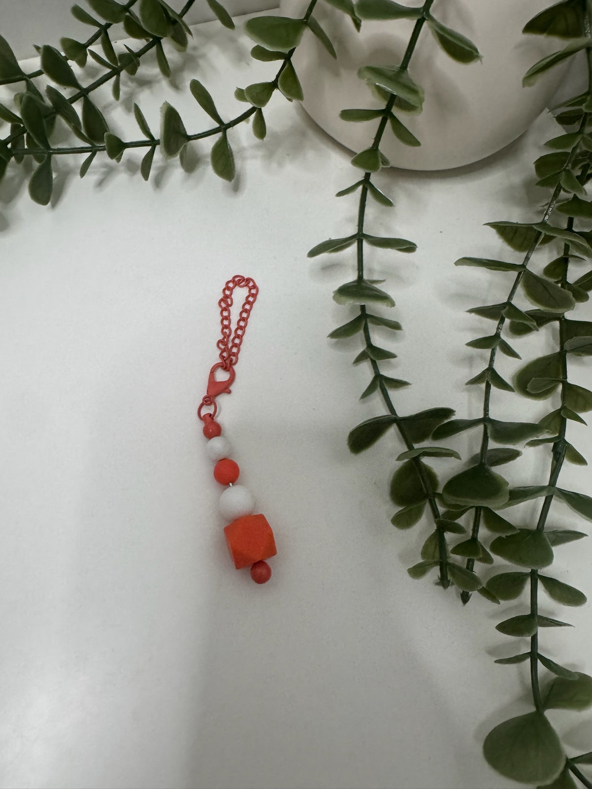 Orange beaded cup charm