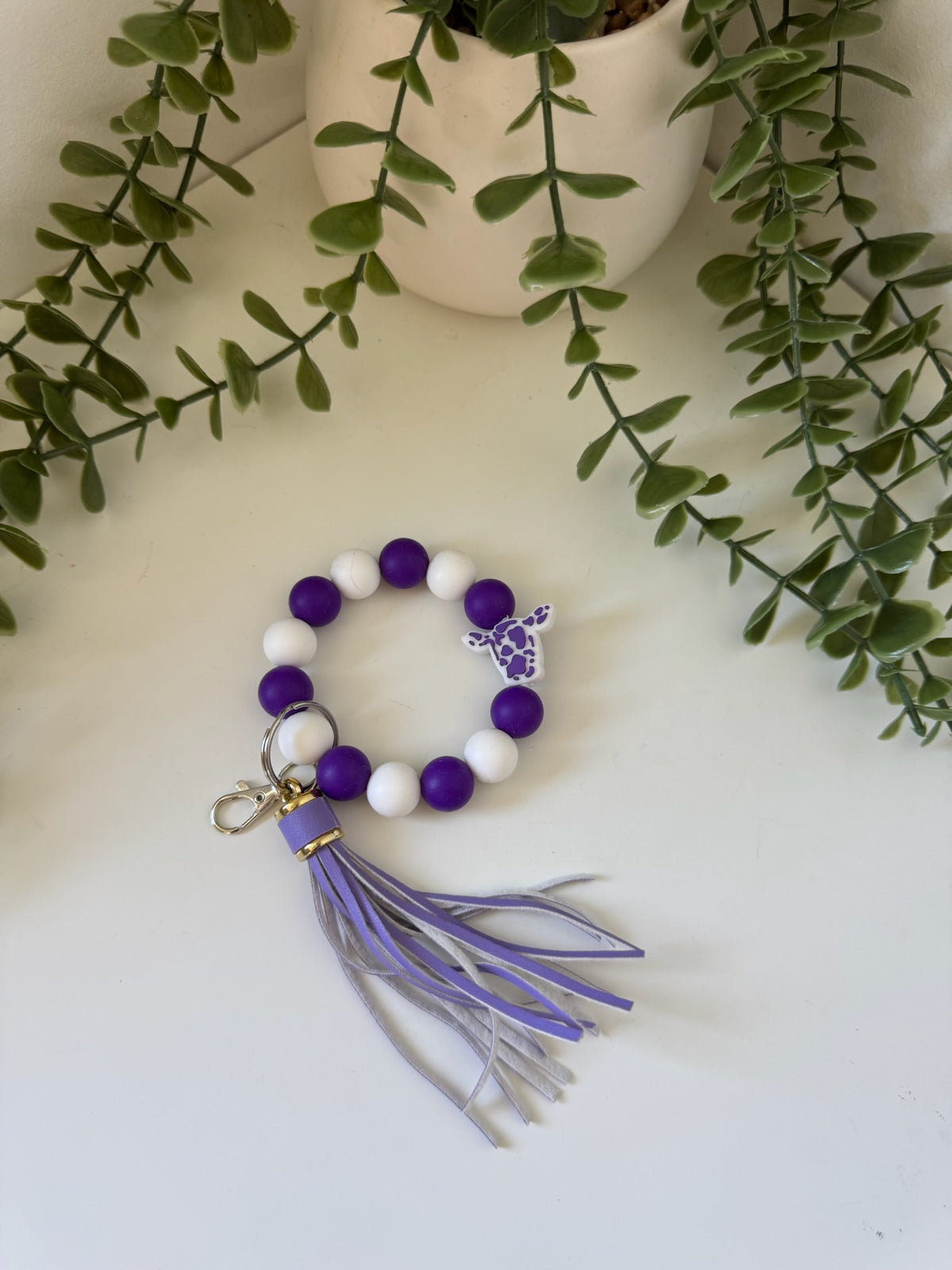 White and purple cow head silicone beaded wristlet
