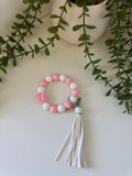Pink and white silicone beaded wristlet