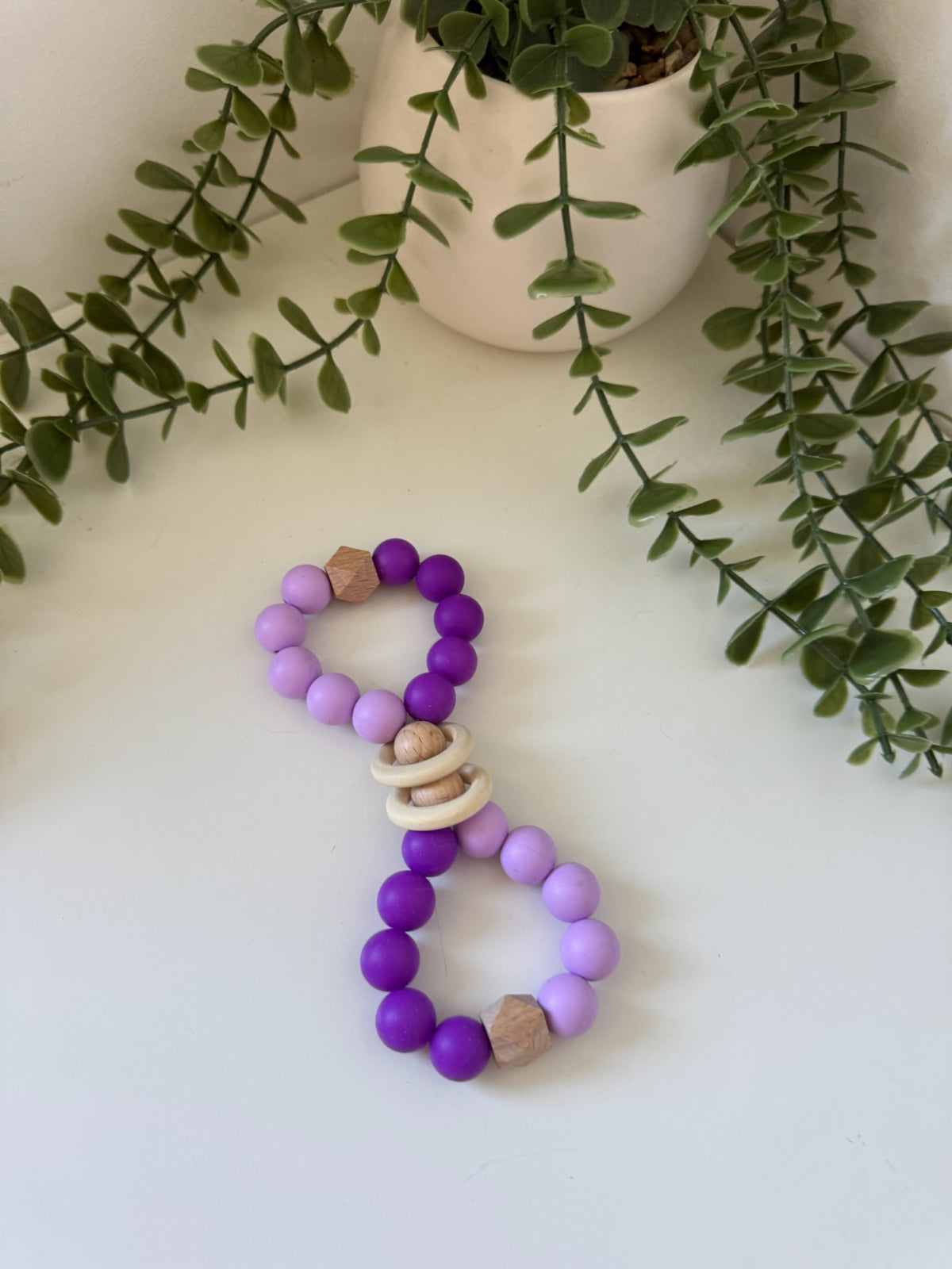 Purple wooden bubble teether