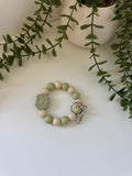 Sage lion head wristlet