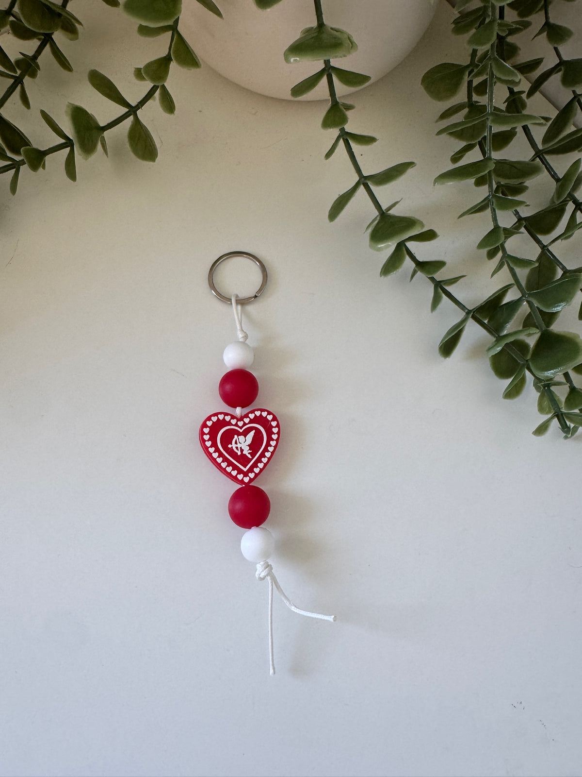 Heart string keychain