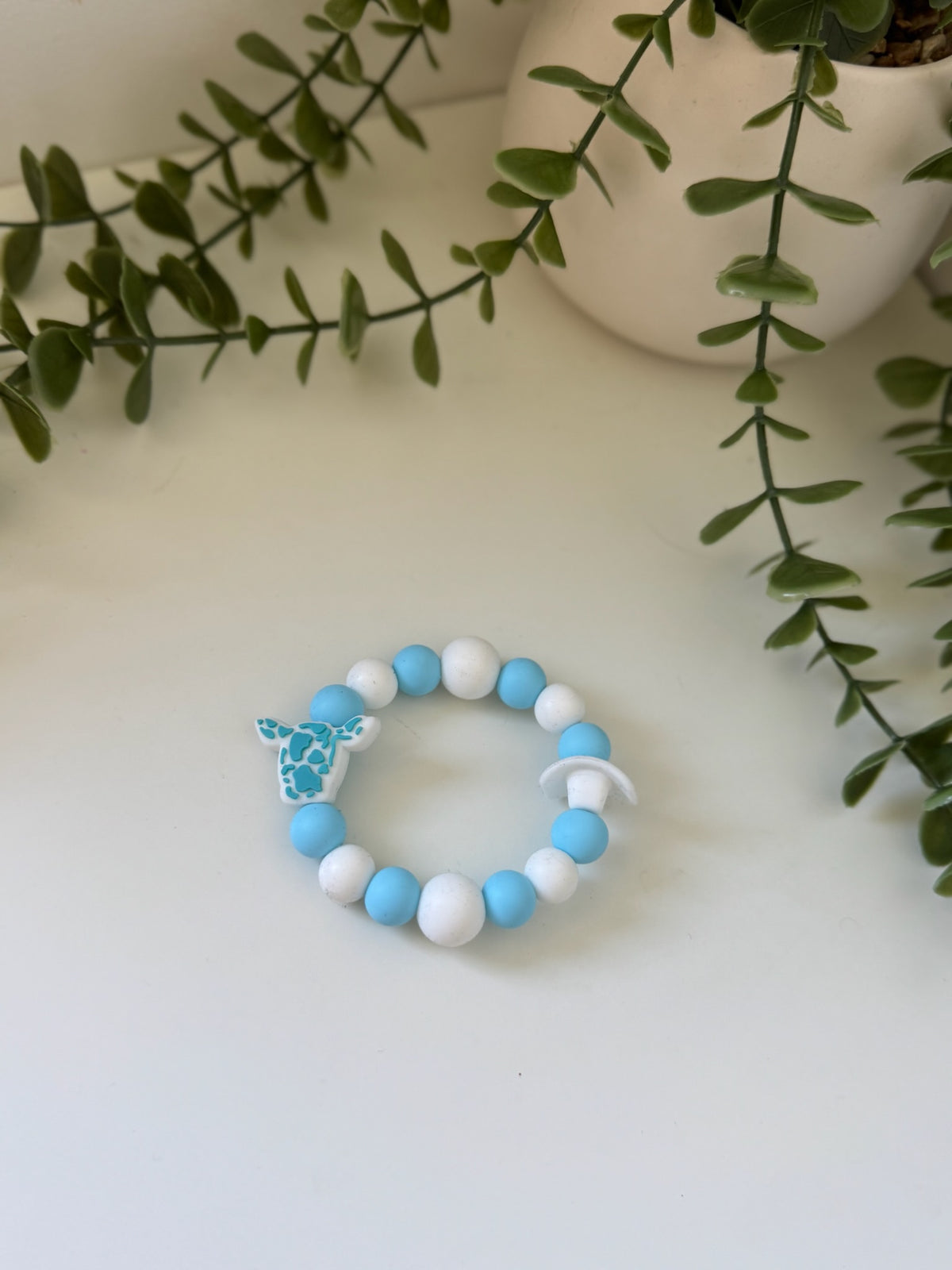 Blue cow head teething ring