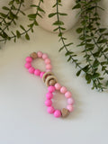 Pink wooden bubble teether