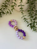 Purple wooden bubble teether