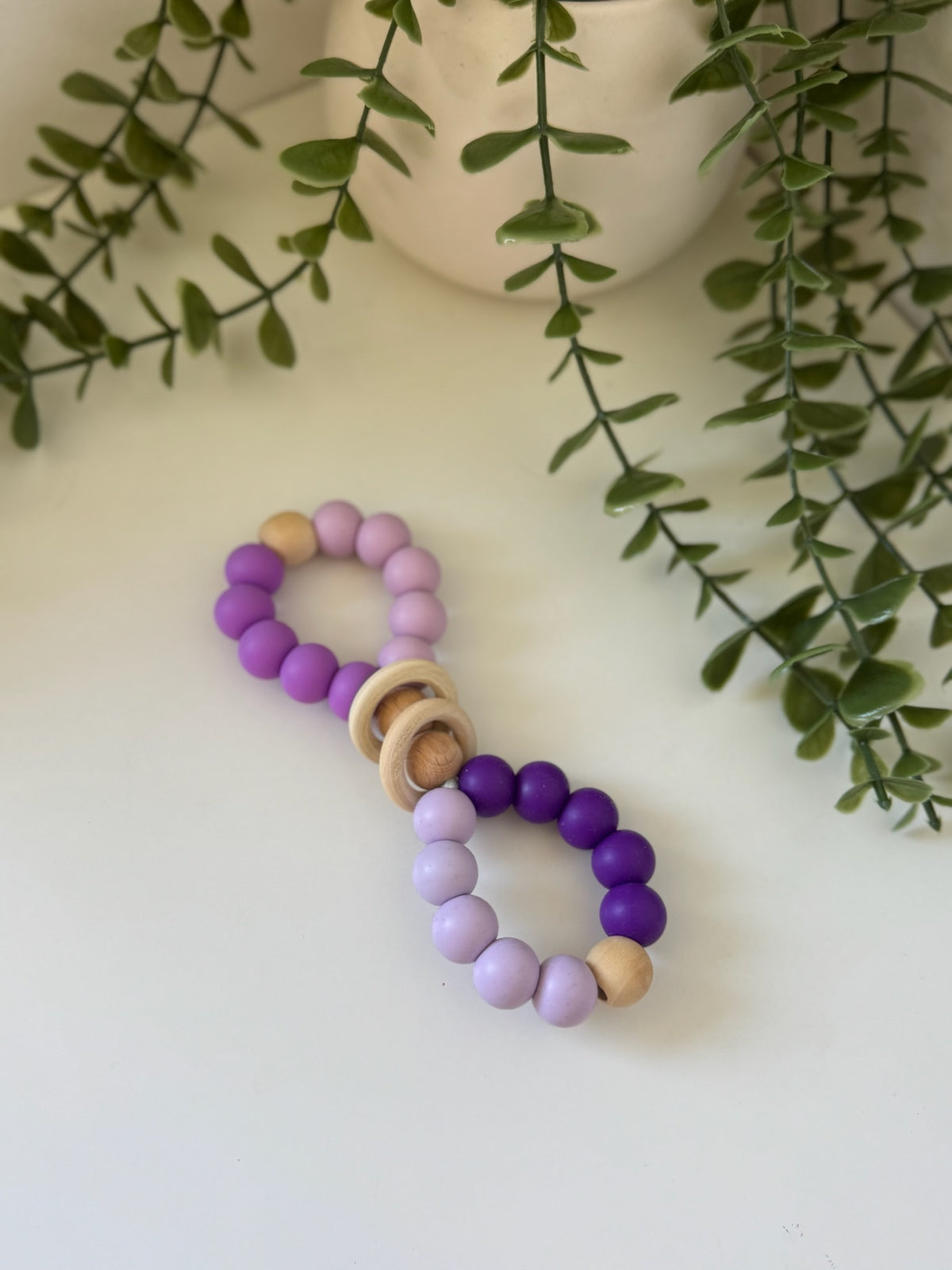 Purple wooden bubble teether