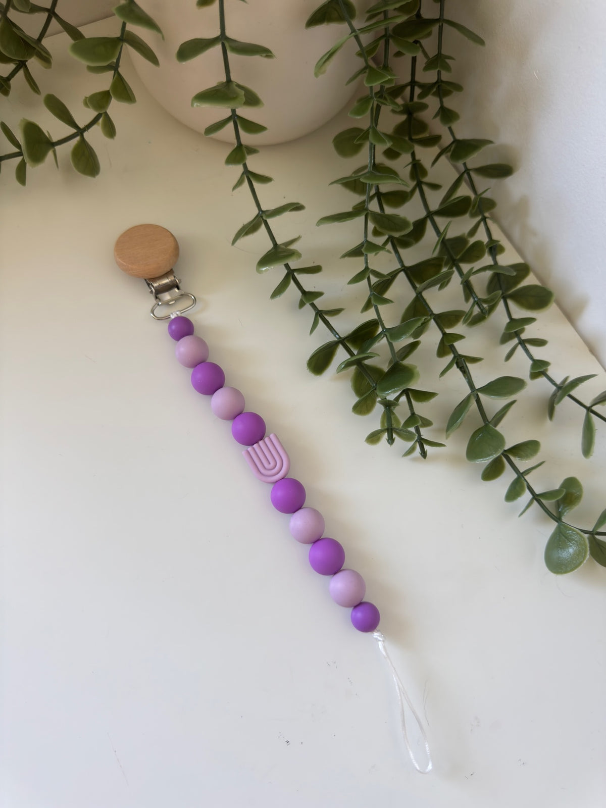 Purple arch dummy clip