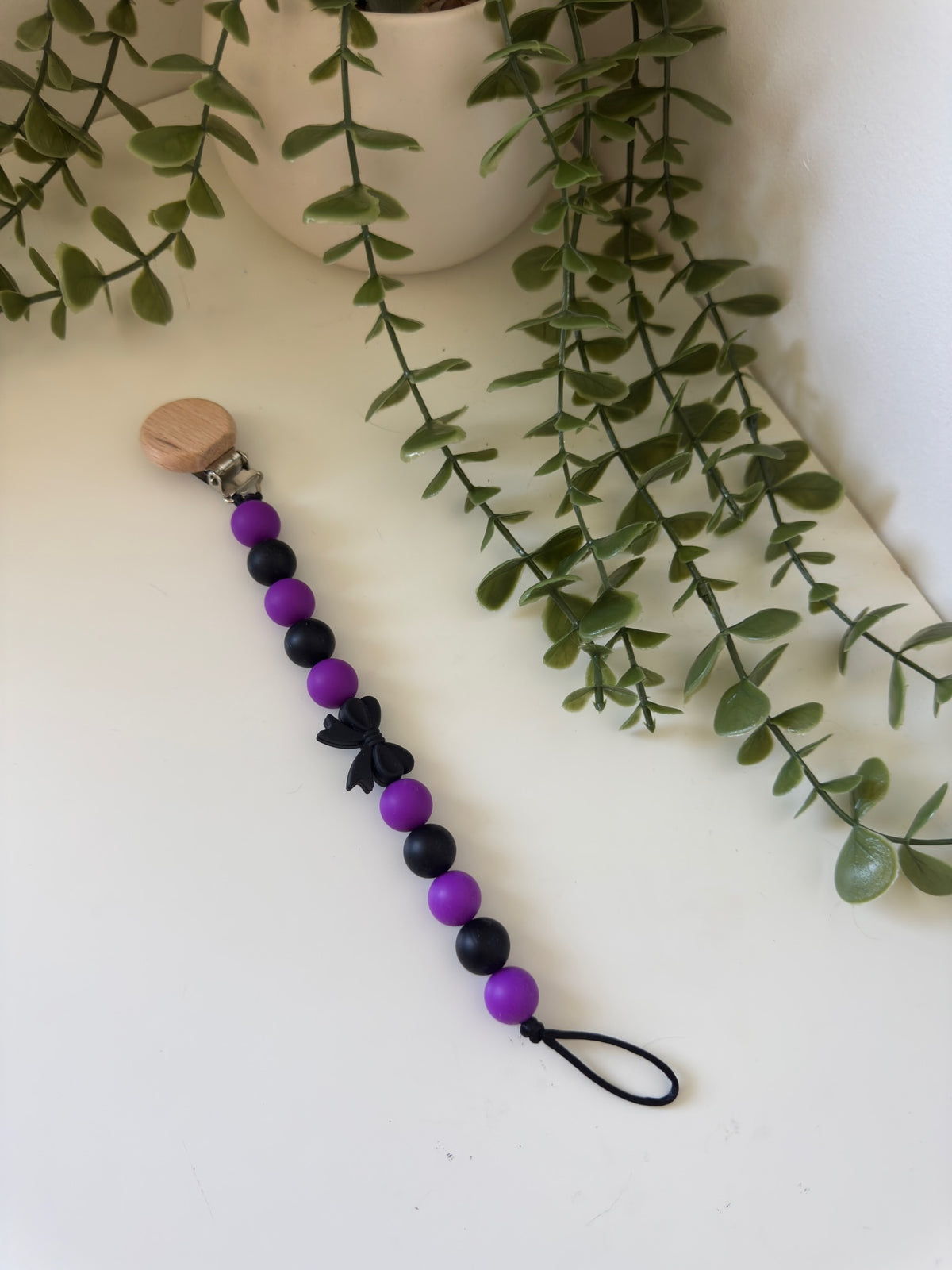 Black bow dummy clip