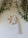 Beige butterfly wristlet