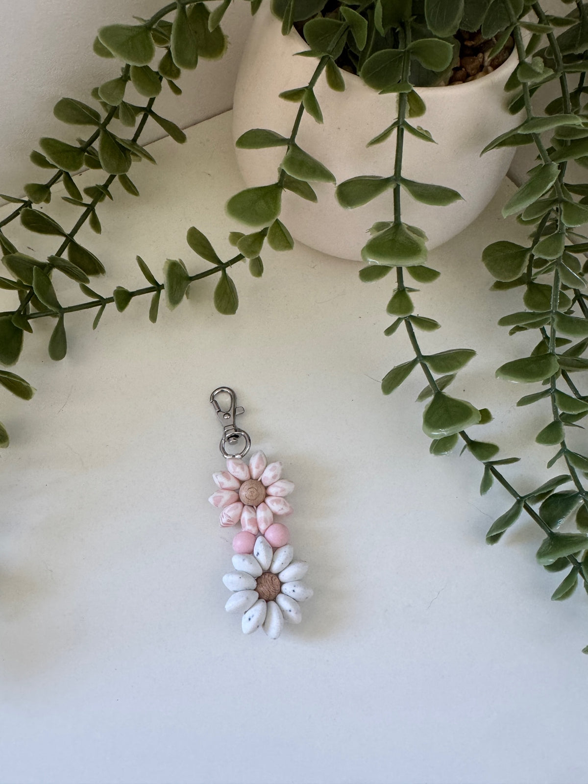Pink cow print double flower keychain