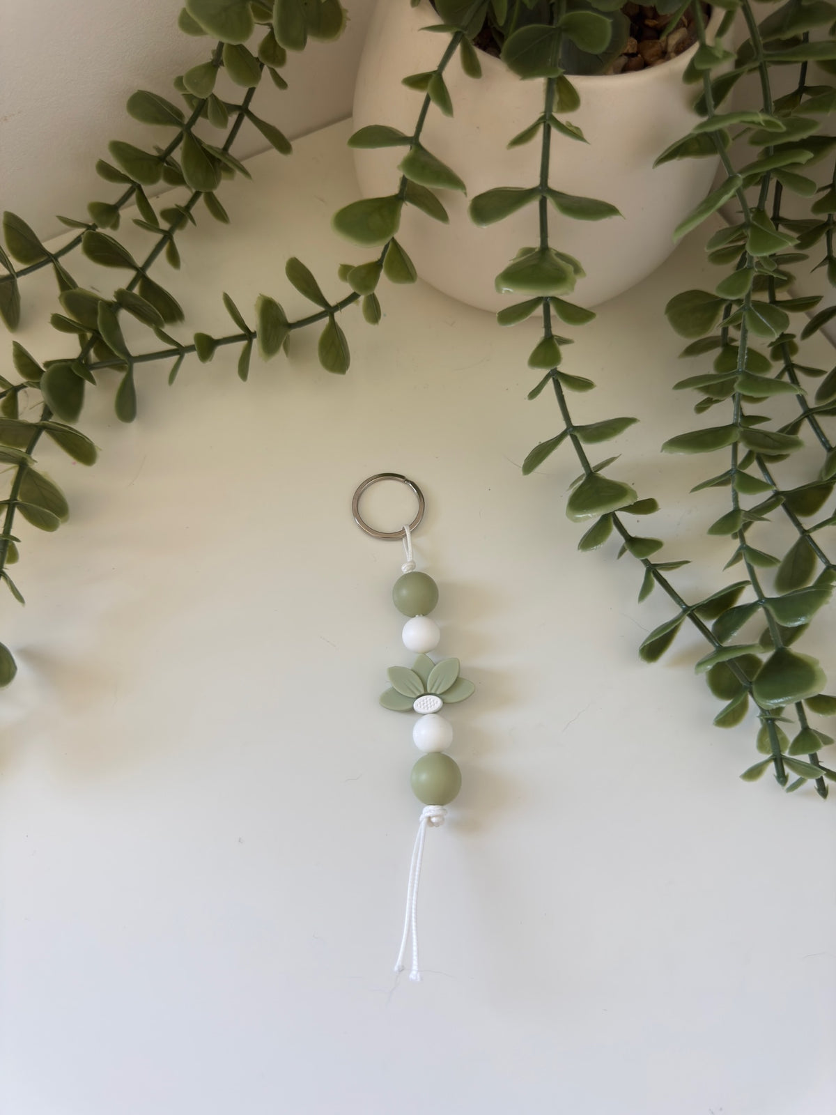 Sage flower string keychain