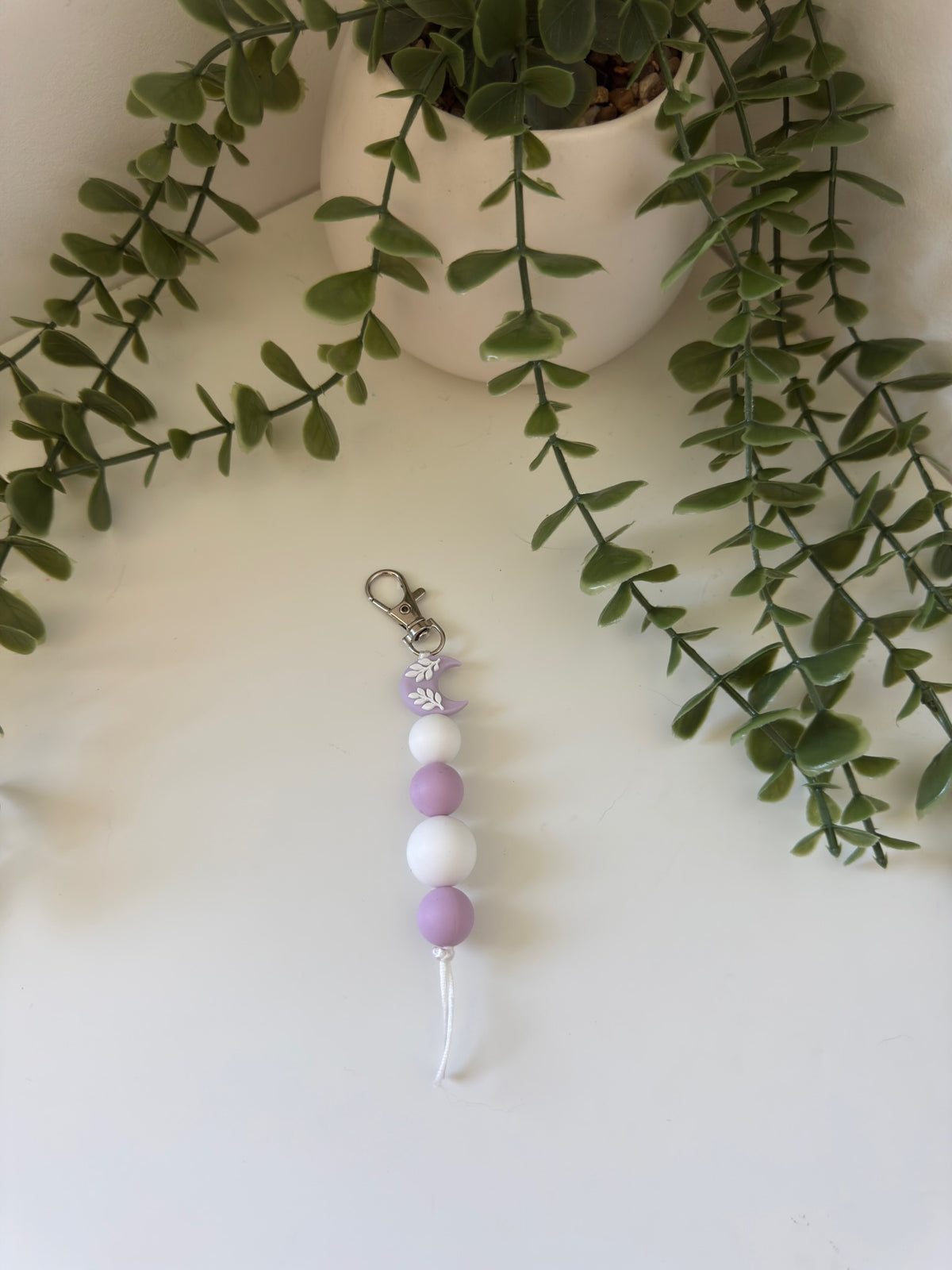 Purple moon string key chain