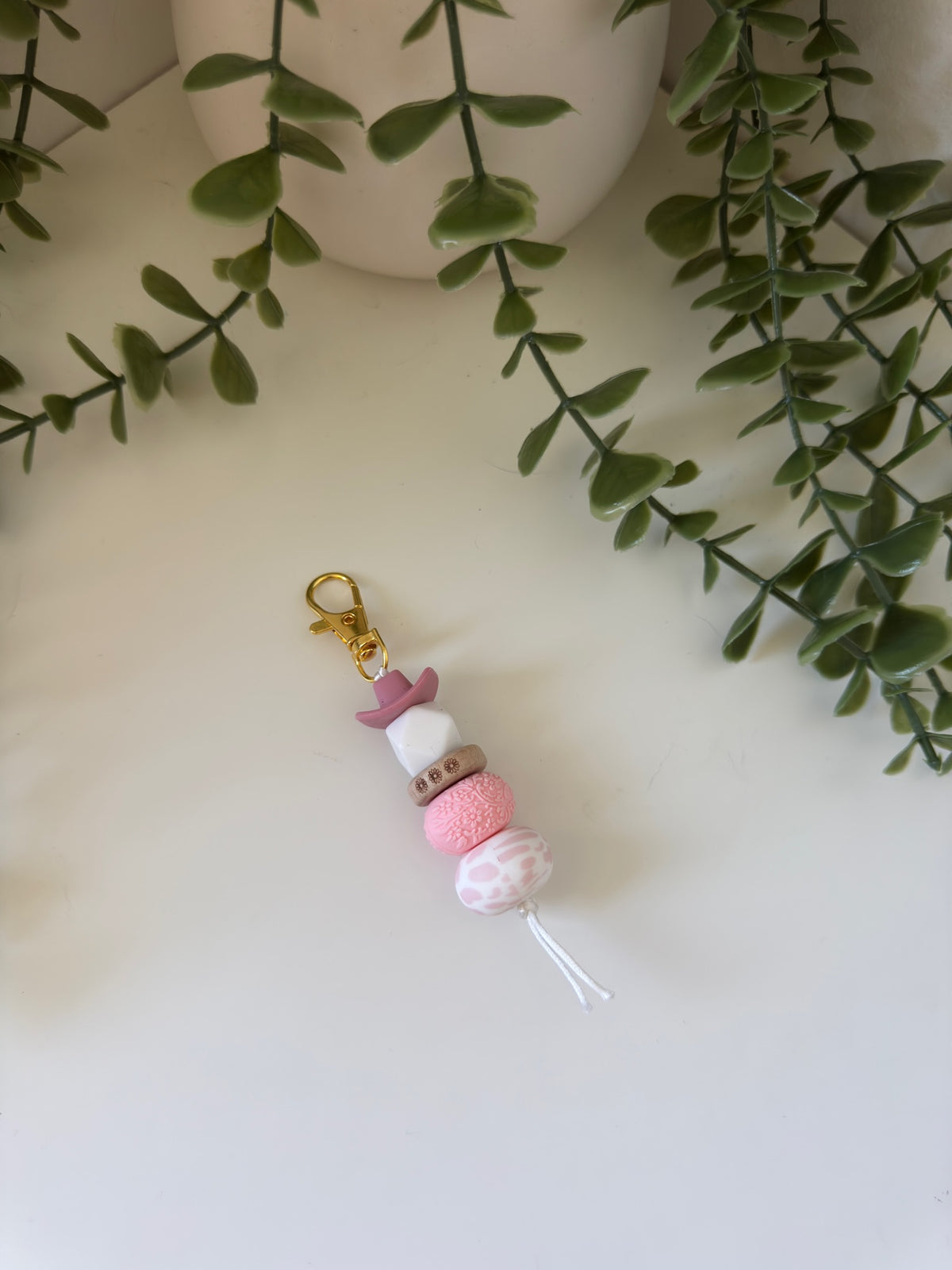 Pink cowboy hat string keychain
