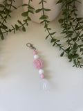 Pink lion head string key chain