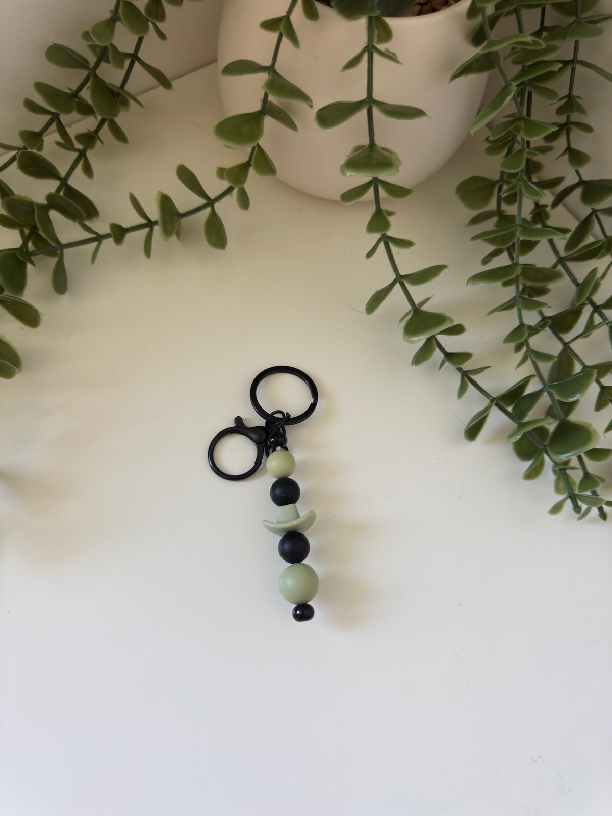 Sage cowboy hat metal keychain
