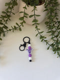 Purple cow head metal keychain