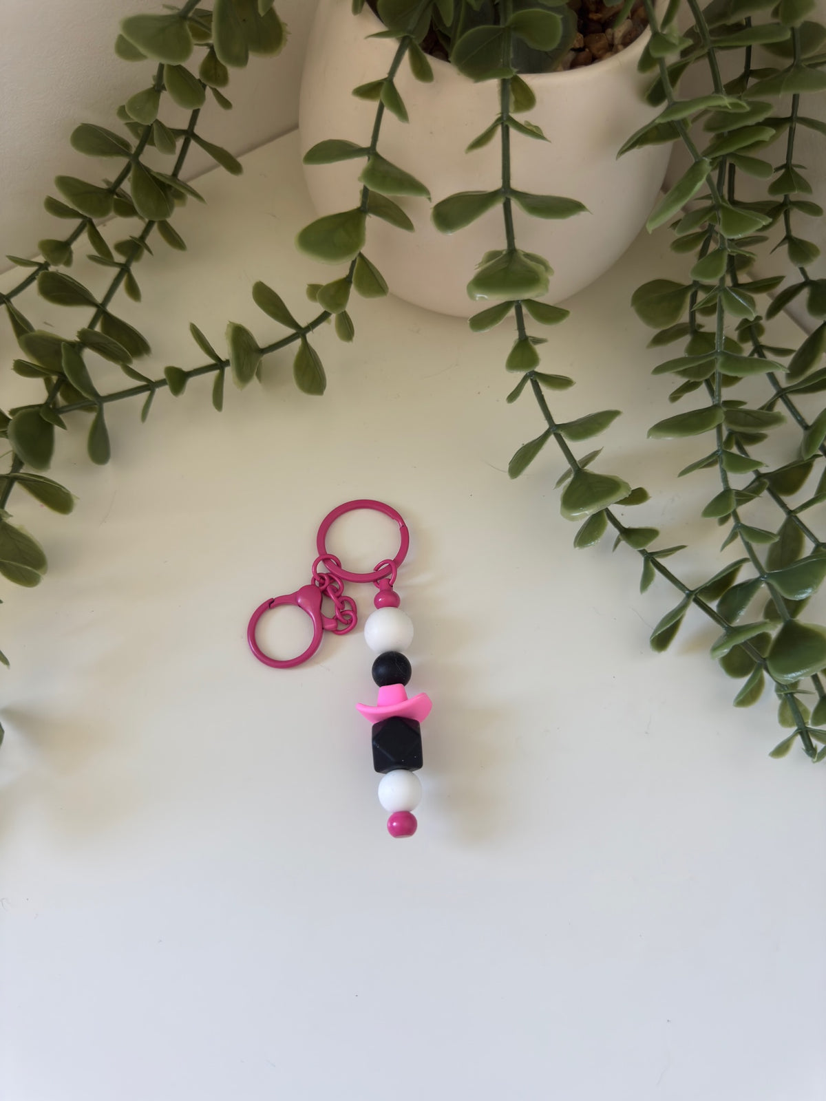 Pink cowboy hat metal keychain