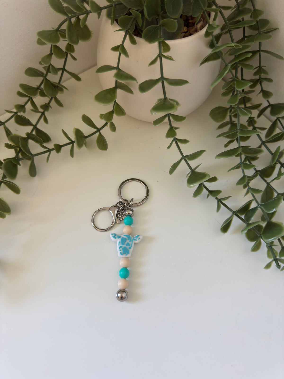 Blue cow head metal keychain
