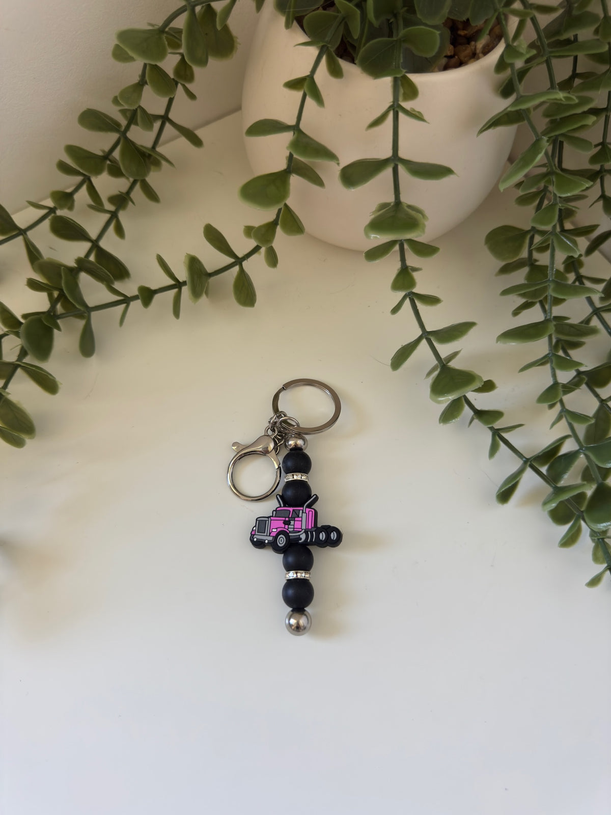 Pink truck metal keychain
