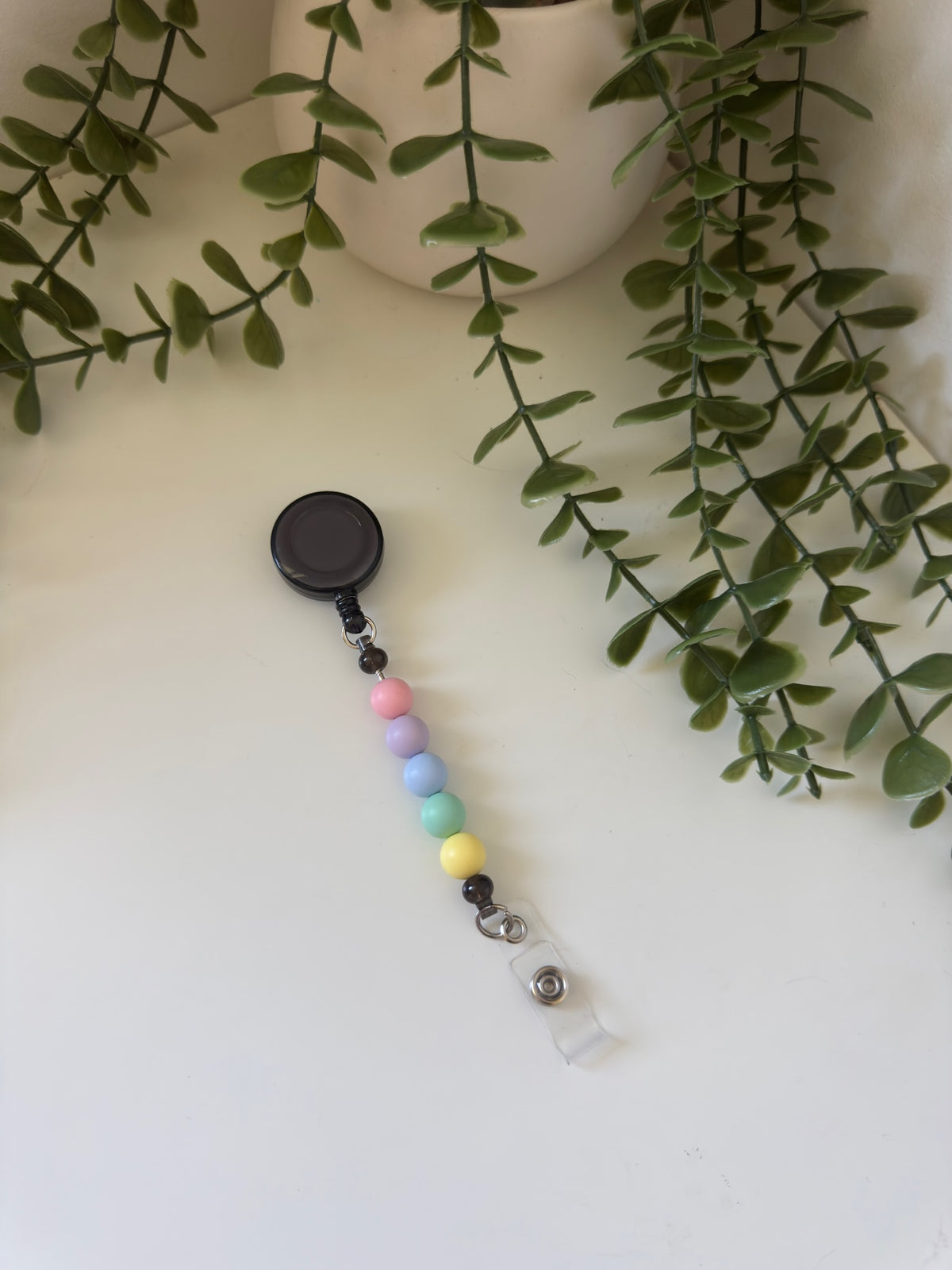Rainbow badge reel