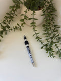 Black cow print pen
