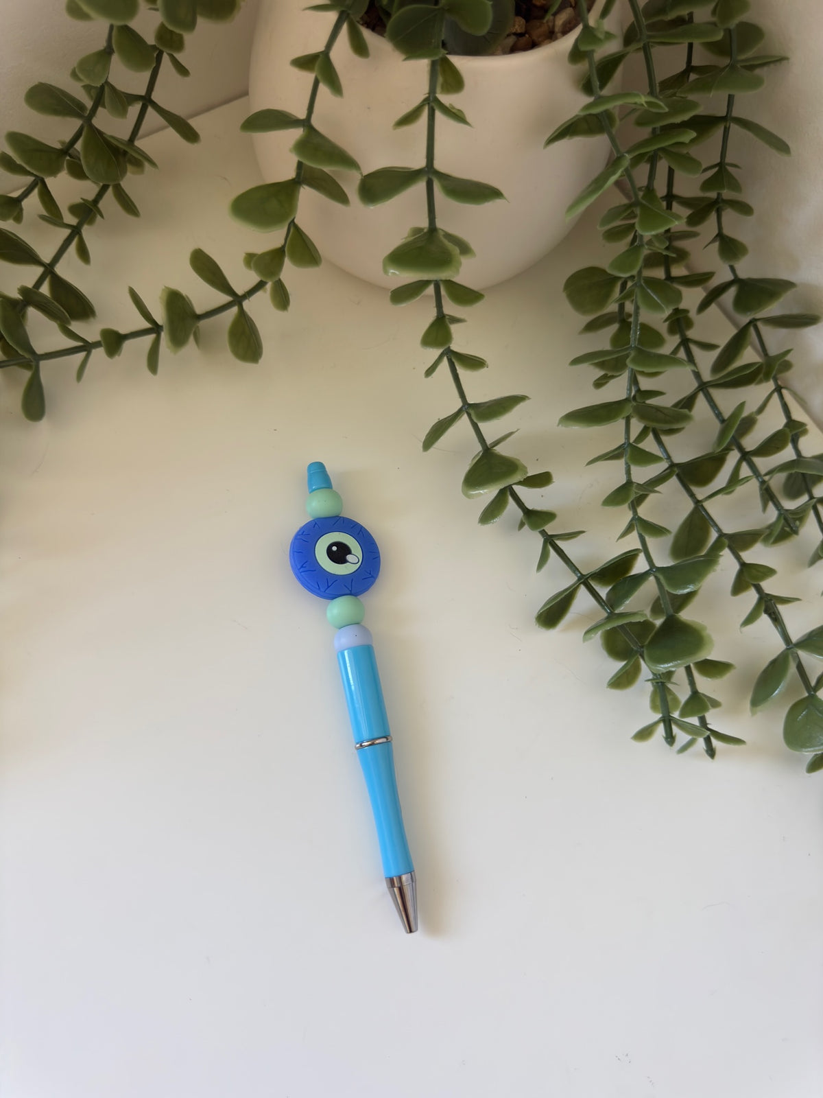 Evil eye pen