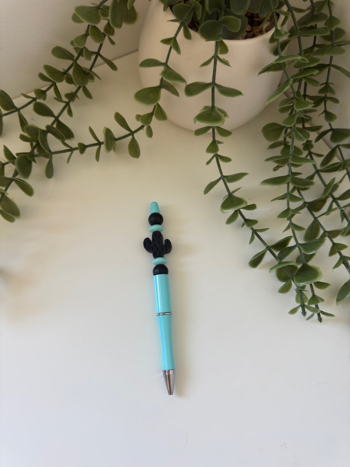 Blue and black cactus pen