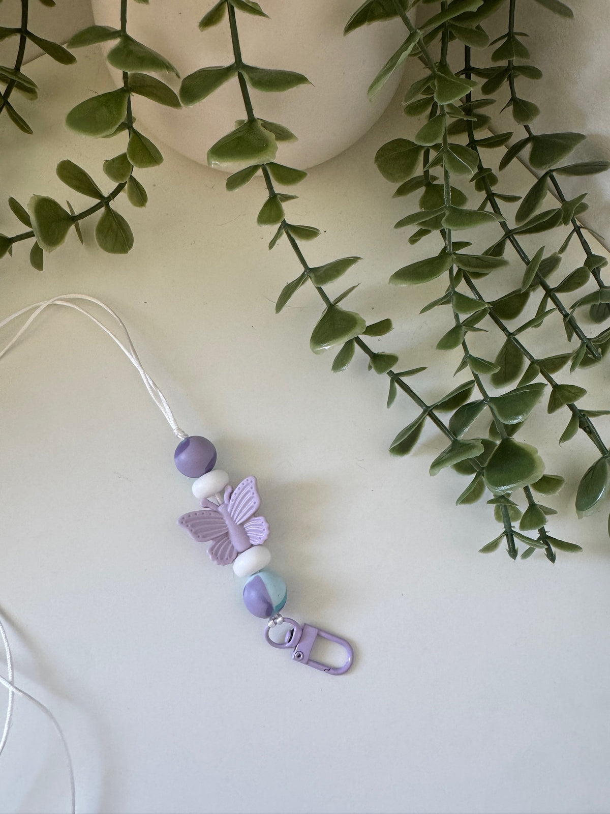 Purple butterfly lanyard