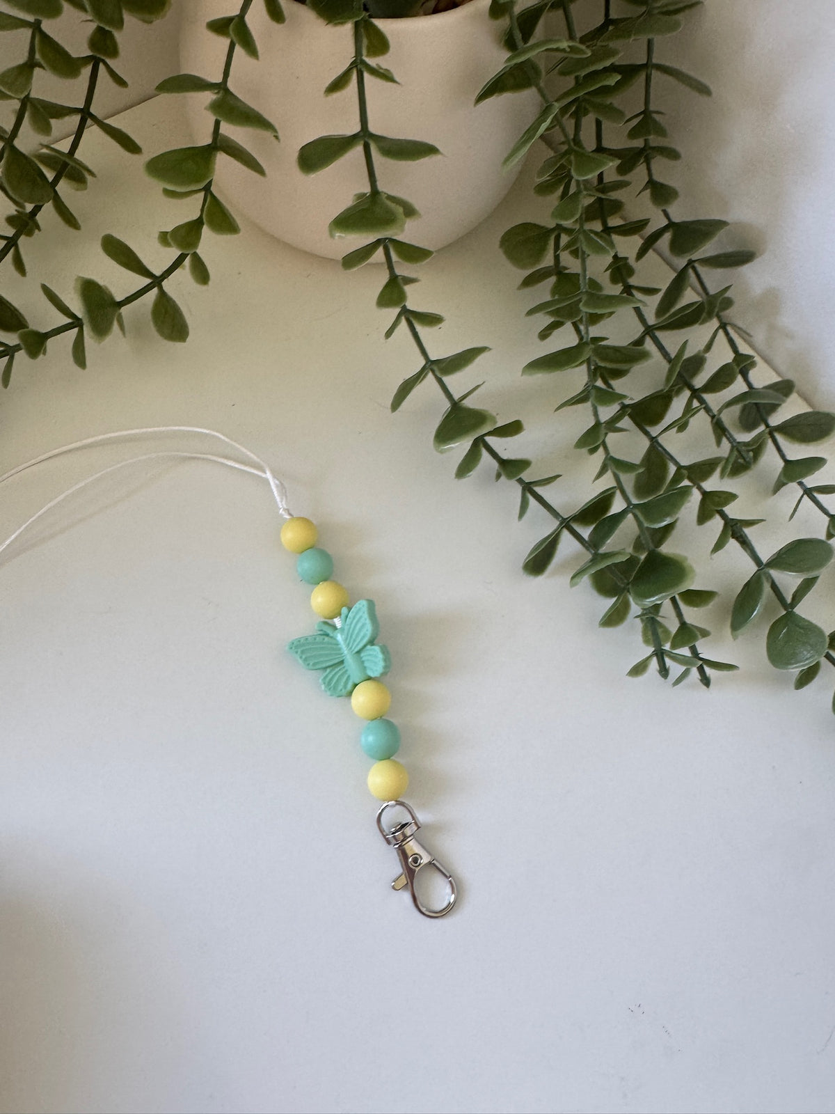 Teal butterfly lanyard