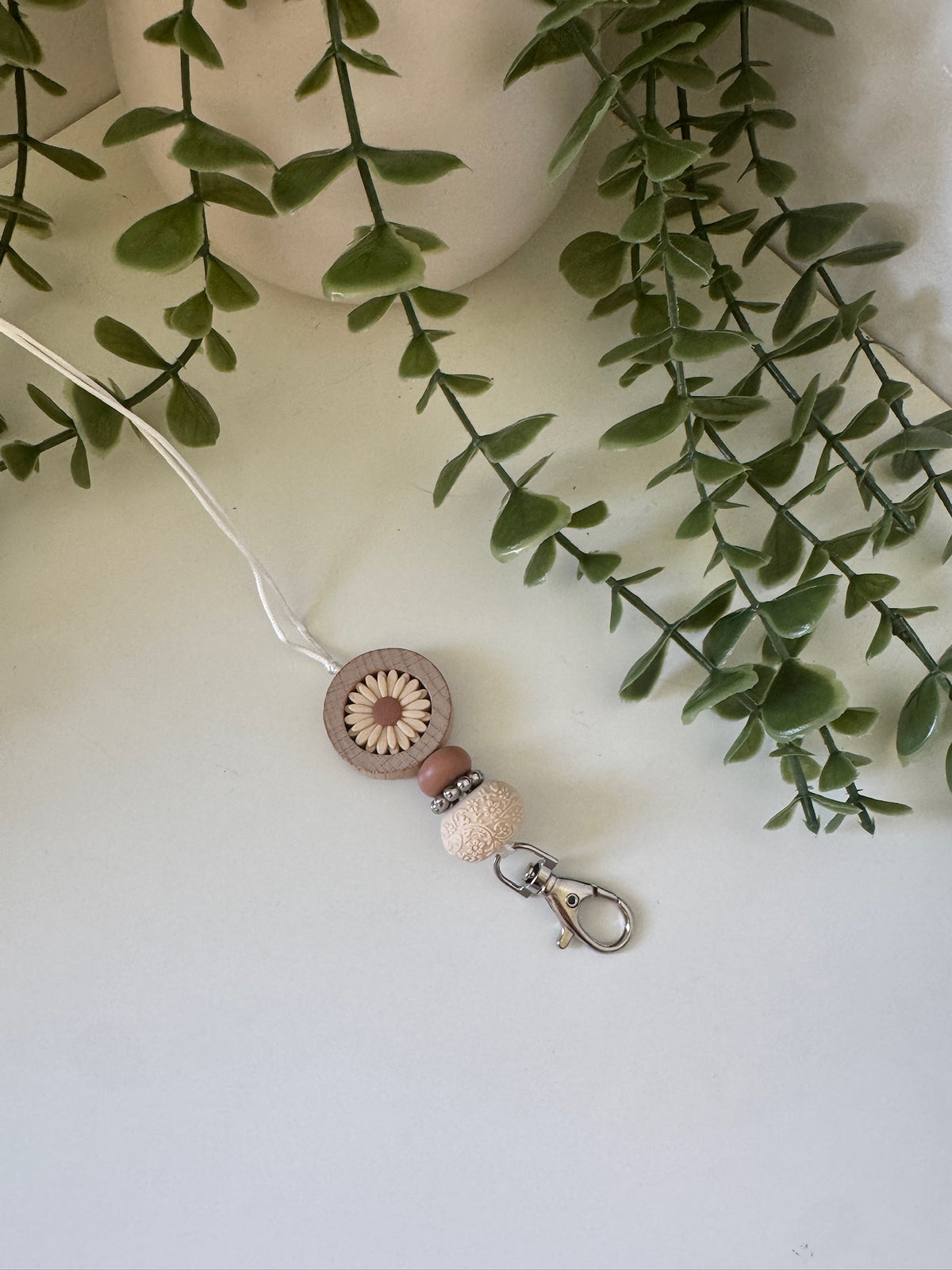 Beige flower lanyard