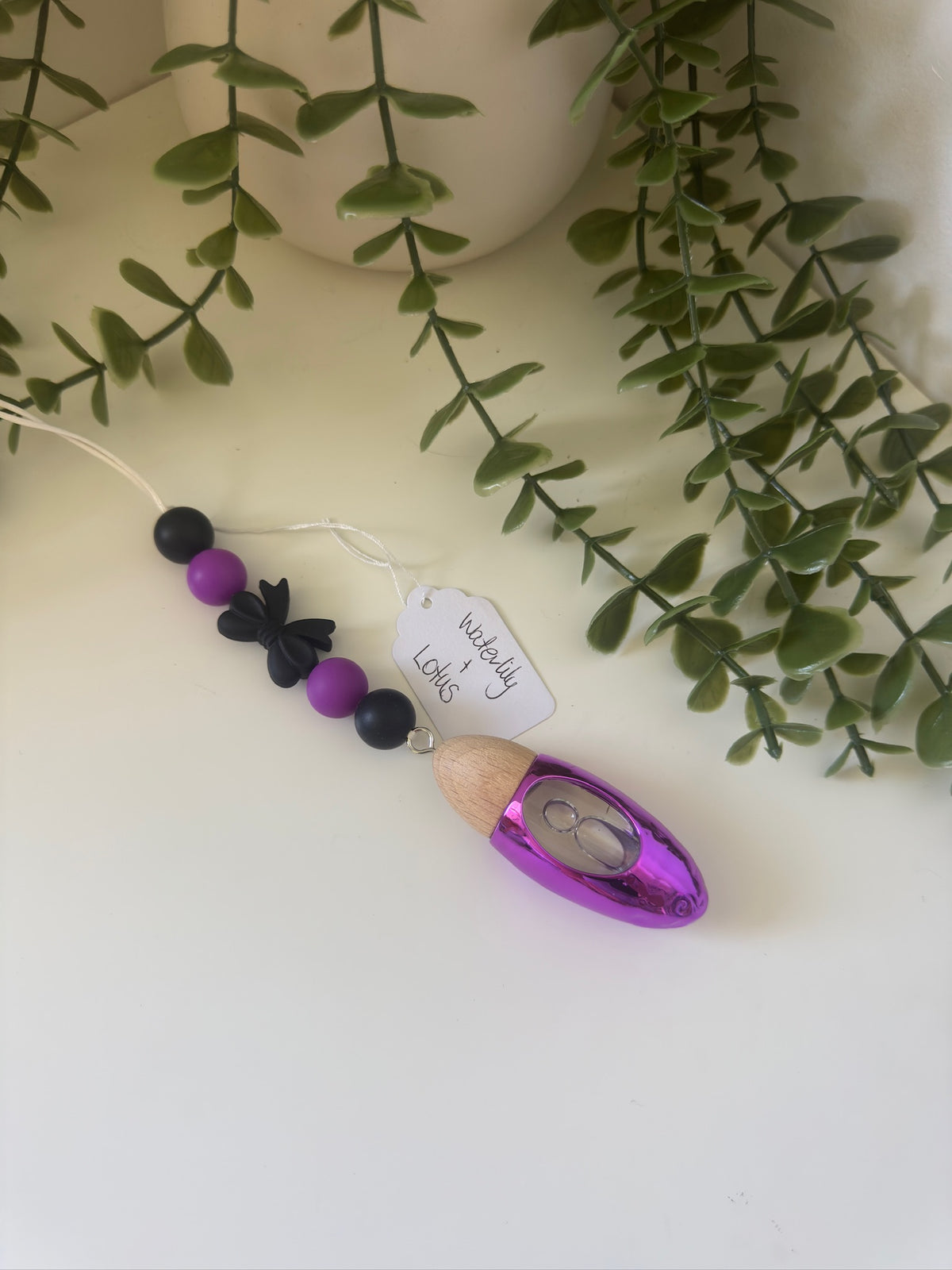 Purple bow car diffuser